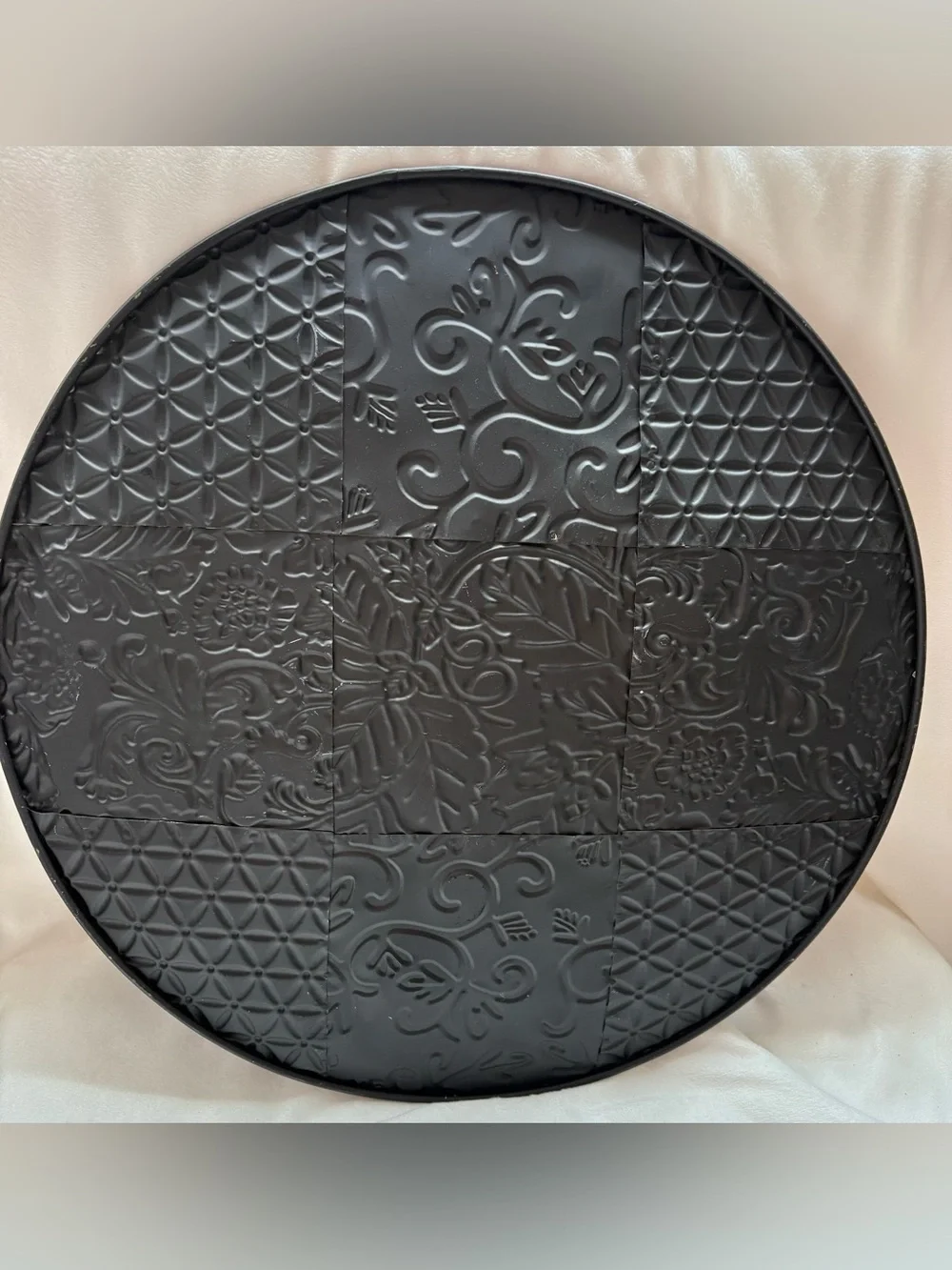 N/A round embossed